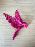Oiseau couleur prune